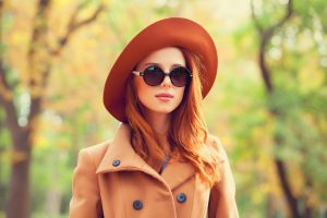 Woman Wearing Jacket, Hat and Sunglasses with Naturally Dyed Hair for Fall | Vitacost.com/Blog
