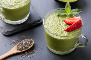 Pumpkin Chia Seed Pudding in Glass Cup with Chia Seeds on Spoon | Vitacost.com/blog