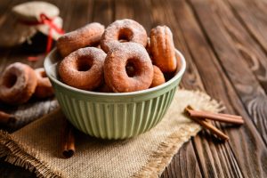 Green Bowl with a Batch of Baked Apple Cinnamon Donuts | Vitacost.com/blog