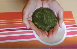 Hands Holding Green Slime Recipe with Natural Slime Ingredients | Vitacost.com/blog