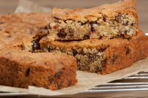 Homemade Muesli Cereal Bars with Cranberries on Paper | Vitacost.com/blog