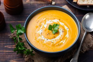 Golden Beet Soup in Bowl with Coconut Cream Swirl | Vitacost.com/blog