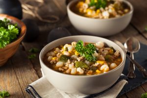 Homemade White Bean Chicken Chili Garnished with Fresh Herbs | Vitacost.com/Blog