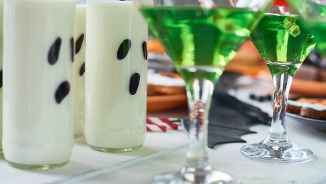 DIY Halloween Decorations on the Cheap Upcycled Wine Bottles Made into Ghosts for Halloween | Vitacost.com/Blog