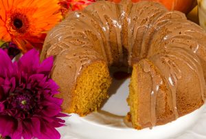 Gluten-Free Gingerbread Bundt Cake with Maple Glaze Decorated by Flowers | Vitacost.com/blog