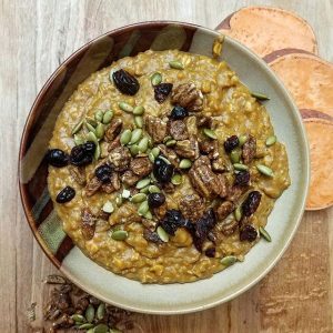 Bowl of Sweet Potato Casserole Breakfast Oatmeal with Pecans, Pumpkin Seeds & Raisins #recipes | Vitacost.com/blog