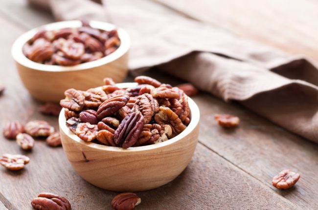 Two Wooden Bowls Brimming with the Benefits of Pecans | Vitacost.com/blog