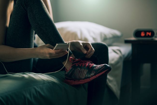 Female Houseguest Quietly Getting Ready in Room for Morning Workout | Vitacost.com/Blog