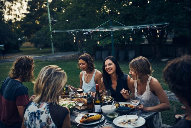 A Group of Friends Enjoying an Eco-Friendly Holiday Party Outdoors | Vitacost.com/Blog