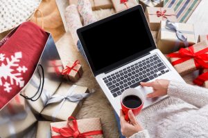 Woman Battling Holiday Stress from Online Shopping and Gift Wrapping | Vitacost.com/blog
