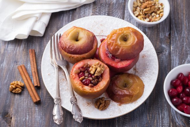 Cranberry-Walnut Stuffed Baked Apples Three Baked Apples with Cranberry-Walnut Stuffing on White Plate | Vitacost.com/blog