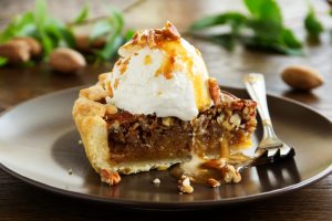 Gluten-Free Pecan Pie Recipe with Scoop of Vegan Ice Cream on Top | Vitacost.com/blog