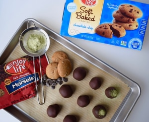 Baking Sheet with Matcha Chocolate Truffles, Box of Enjoy Life Cookies, Bag of Enjoy Life Chocolate Chips and Scoop of Matcha Powder | Vitacost.com/blog
