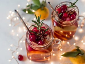 Overhead View of Winter Sangria With Red Wine Extract Surrounded by Twinkling Lights in White Table | Vitacost.com/blog