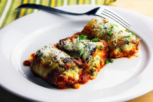Three Eggplant Roll-Ups on a White Plate with Fork | Vitacost.com/blog