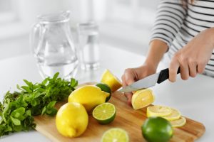 What is a Cleanse? This Woman Slices Lemons, Limes & Fresh Herbs to Detox Her Body | Vitacost.com/blog