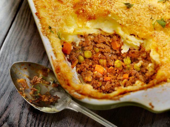 Easy Dairy-Free Shepherd's Pie Recipe Easy Shepherd's Pie in a Casserole Dish with a Piece Spooned Out | Vitacost.com/blog