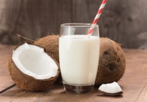 Homemade Kefir in a Glass with Straw and Fresh Coconut | Vitacost.com/blog
