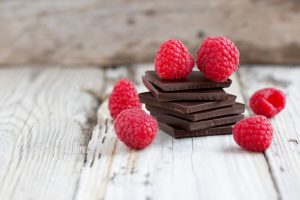 Stack of Dark Chocolate Squares with Fresh Raspberries | Vitacost.com/blog