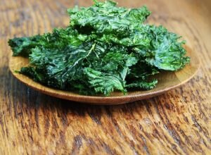 Baked Kale Chips on a Wooden Plate | Vitacost.com/blog