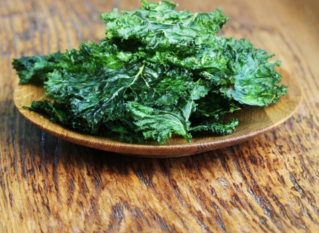 Baked Kale Chips on a Wooden Plate | Vitacost.com/blog