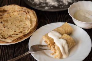 Two Breakfast Wraps on a Plate with Vanilla Cream | Vitacost.com/blog