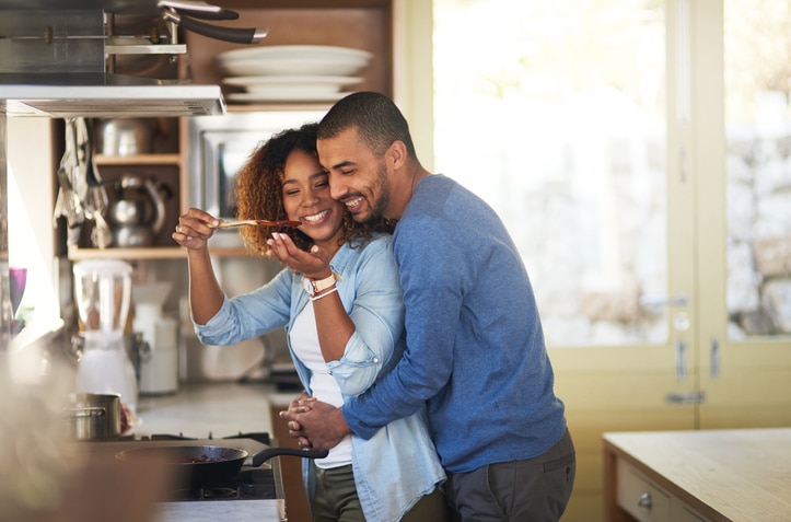 Couple Trying to Lose Weight Cooking Together and Tasting Food | Vitacost.com/blog