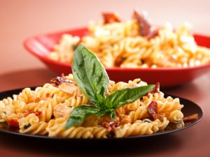 Fusilli pasta with sun-dried tomatoes and basil