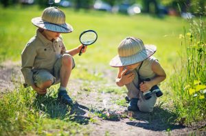 Kids in Safari Outfits Enjoying Family Staycation Ideas in Grassy Backyard | Vitacost.com/blog