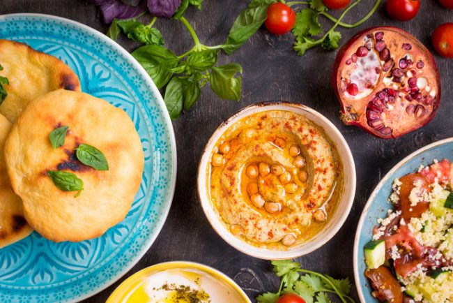 Dinner Table Featuring a Healthy Mediterranean Feast | Vitacost.com/Blog