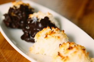 Cookie recipe: chocolate-dipped macaroons lined up on a tray | Vitacost.com/blog