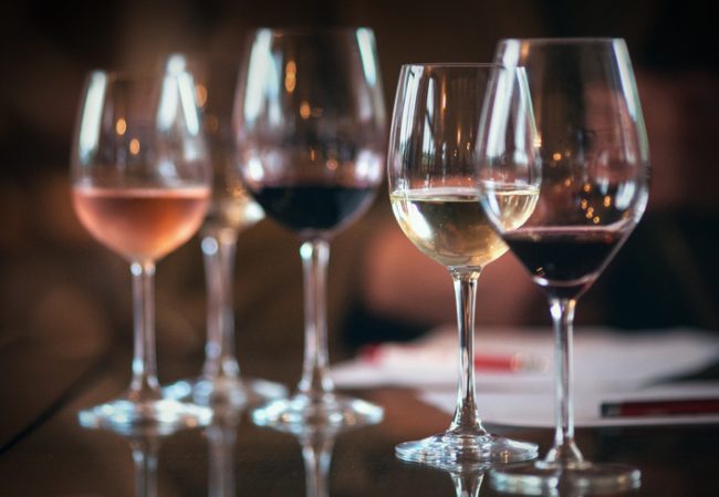 Four Glasses of Various Heights Filled With Different Types of Organic Wine | Vitacost.com/blog
