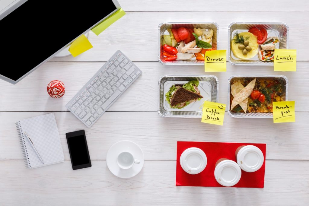 A 1-Week Keto Meal Plan Includes Food Prep Containers on Work Desk With Sticky Notes to Stay Organized | Vitacost.com/blog
