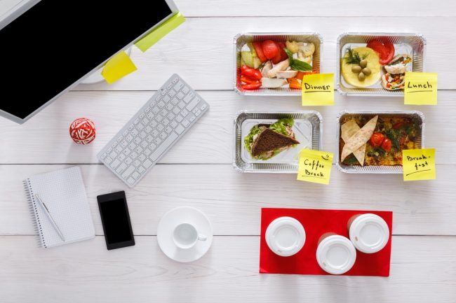 A 1-Week Keto Meal Plan Includes Food Prep Containers on Work Desk With Sticky Notes to Stay Organized | Vitacost.com/blog