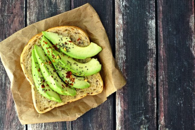 Avocado Toast on Brown Wrapper Representing Good Food for Hair Growth | Vitacost.com/blog