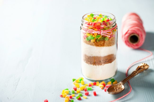 Example of Mason Jar Gift Ideas With Layered Cookie Mix Topped by Colorful Candies | Vitacost.com/blog