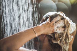 Woman Washing Hair in Shower with Collagen Shampoo | Vitacost.com/Blog