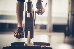 This Woman’s Legs on a Stationary Spin Bike Enjoy the Cycling Benefits From Her Workout | Vitacost.com/blog