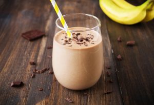 Chocolate Cauliflower Smoothie with Banana on Wood Background | Vitacost.com/blog
