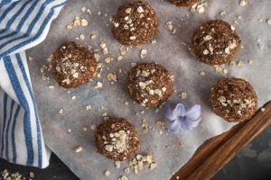 Chocolate Granola Clusters Topped With Granola on Wood Tray | Vitacost Blog