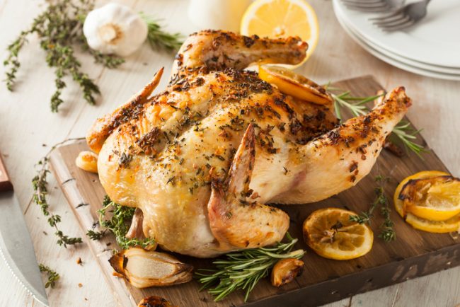 Oven Roasted Lemon Rosemary Chicken  Oven Roasted Lemon Rosemary Chicken on Wood Cutting Board | Vitacost.com/blog