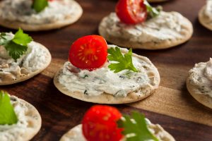 Herb Vegan Cashew Cheese Spread on Crackers | Vitacost.com/blog