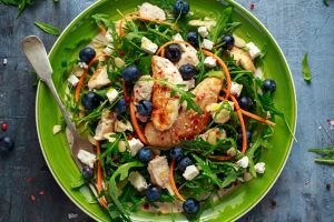 Fresh Salad with Chicken and Blueberries on Green Plate | Vitacost Blog