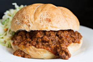 Easy Homemade Sloppy Joes #recipe on Plate With Coleslaw in Background | Vitacost Blog