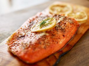Grilled Cedar Plank Salmon With Lemon Wedges on Cedar Plank #recipe | Vitacost.com/blog