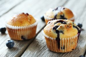 Protein Blueberry Muffins on Wood | Vitacost.com/blog