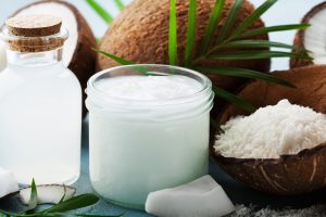 Close Up of Cream Surrounded by Coconuts and Plants | Vitacost Blog