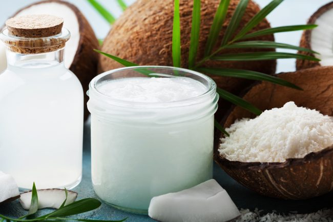 Close Up of Cream Surrounded by Coconuts and Plants | Vitacost Blog