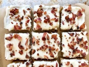 Freshly made pumpkin bars with maple bacon frosting