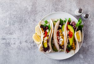 Tacos Filled with Beans, Cilantro, Avocado, Corn and More | Vitacost Blog